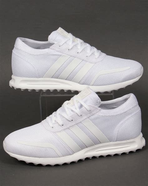 all white adidas trainers|all white adidas originals.